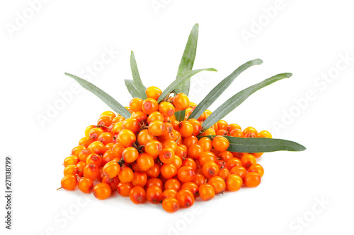 heap of sea buckthorn with green leaves  isolated on white