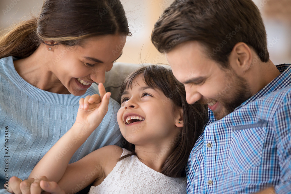 Happy young family with kid relax having fun at home Happy young family with kid relax having fun at home