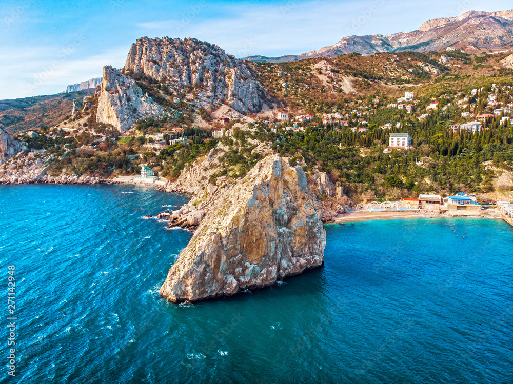 Aerial view of rock cliff in sea resort beach in Crimea, drone shot ...