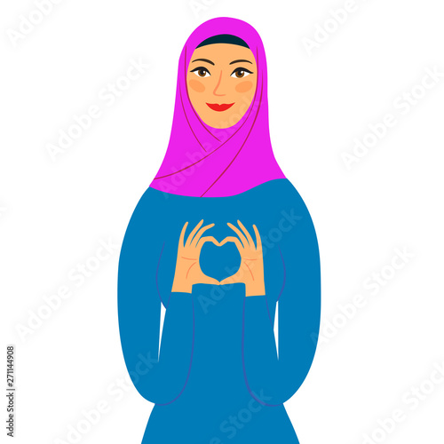 Lovely girl in hijab showing heart symbol with her fingures. photo