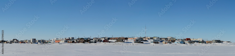 Panoramic view of Cambridge Bay, Nunavut, a far northern arctic community, during a sunny winter day