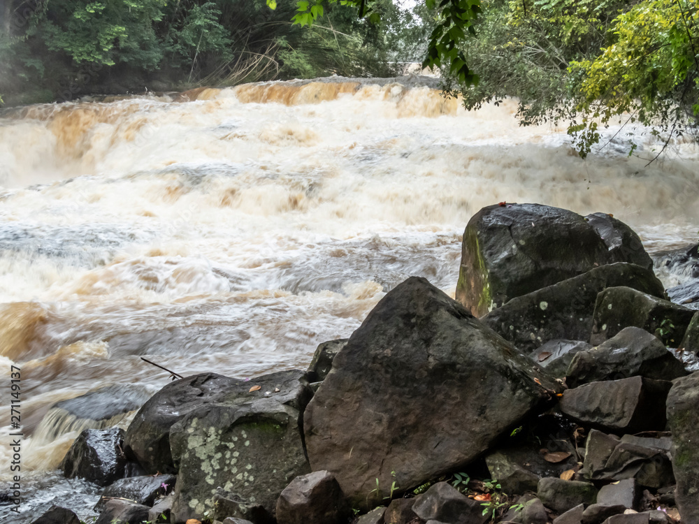 waterfall in Jacare Pepira River in Saltos public Park, in Brotas city waterfall in Jacare Pepira River in Saltos public Park, in Brotas city