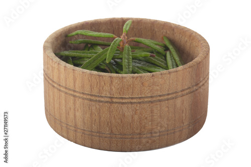 freshheap of wild rosemary in wooden cup  isolated on white background photo