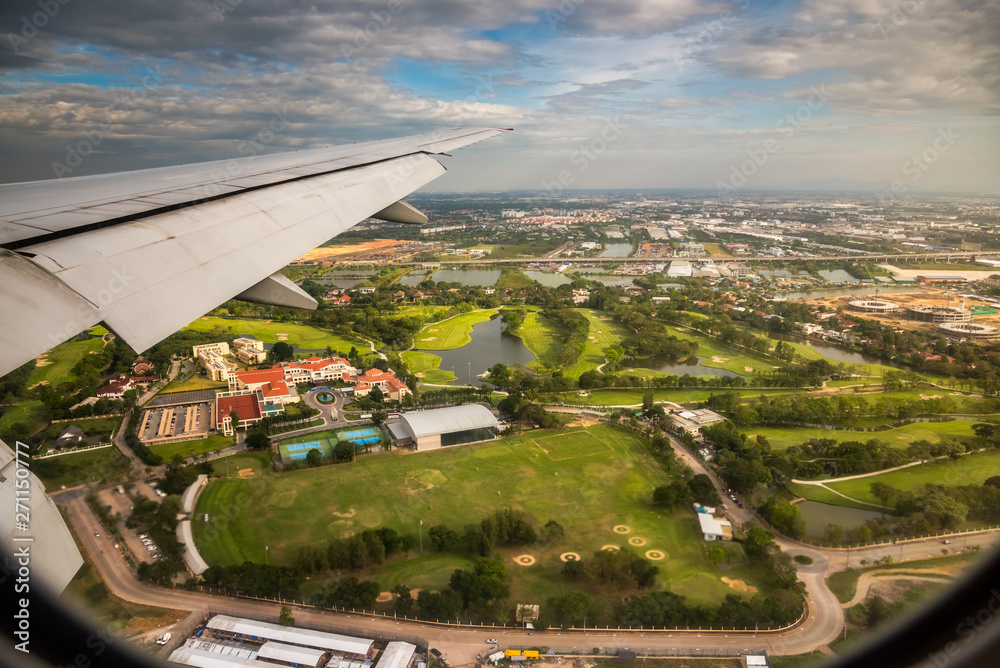 Aerial View from Window of Airplane. Flying above Bangkok.