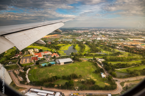 Obraz na płótnie Aerial View from Window of Airplane. Flying above Bangkok. w salonie