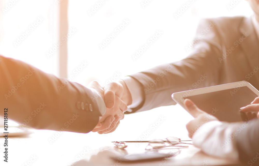 close up.confident handshake of business people in the office