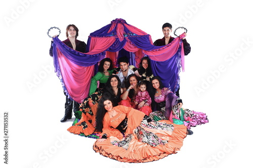 portrait of a Gypsy dance group in the background of the tent
