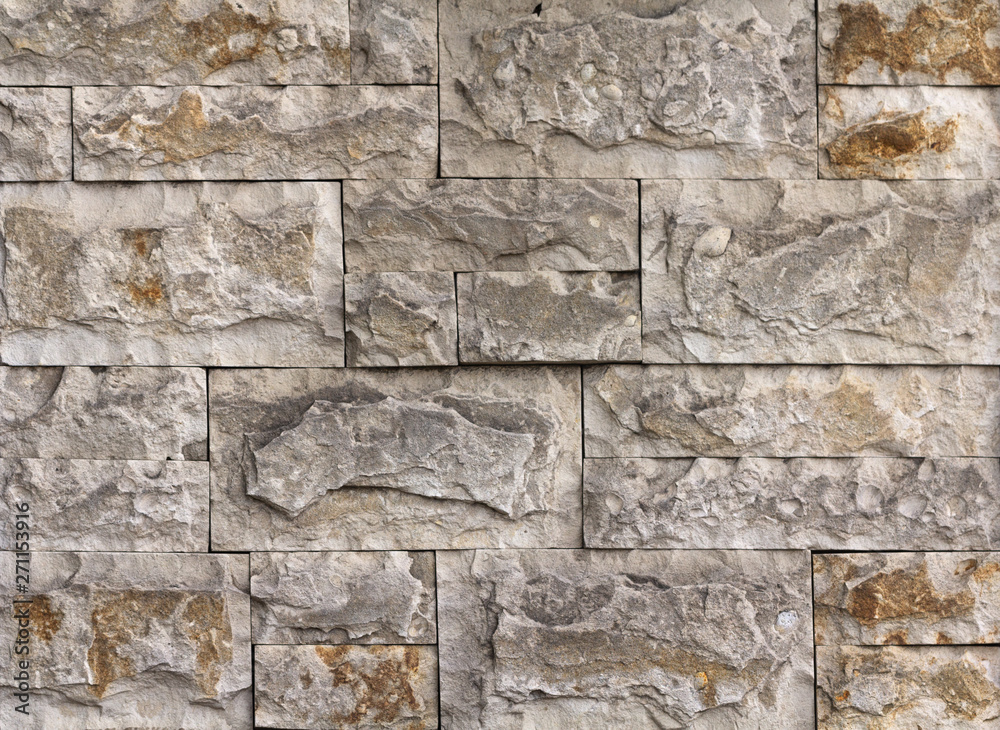 Wall of high quality travertine or thermolith. Blank for background or tile Wall of high quality travertine or thermolith. Blank for background or tile