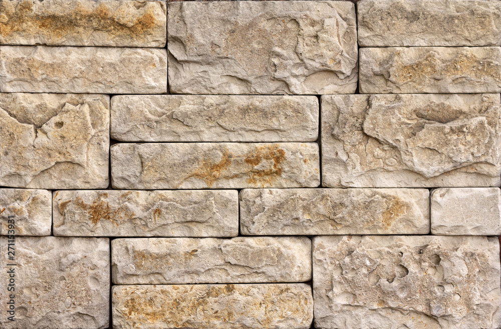 Fototapeta premium Wall of high quality travertine or thermolith. Blank for background or tile