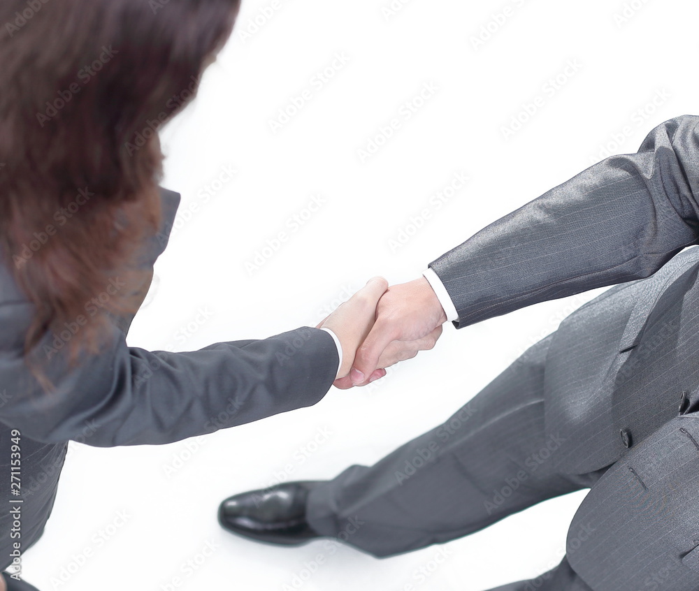 closeup of a business handshake men and business women.