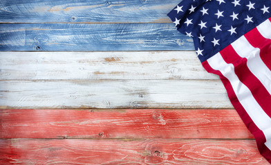 United States flag of America on rustic wooden boards painted in traditional national colors with plenty of copy space
