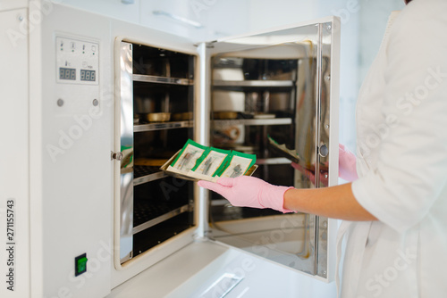 Wallpaper Mural Antibacterial cabinet, beautician cleans tools Torontodigital.ca