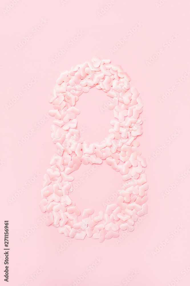 Number eight collected from decorative pink hearts. Isolated on pink background