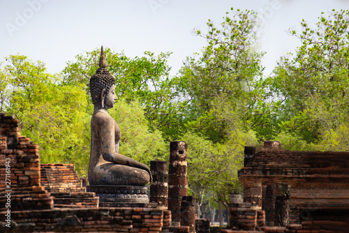 Sukhothai Wat Mahathat Buddha statues at Wat Mahathat ancient capital of Sukhothai  Thailand. Sukhothai Historical Park is the UNESCO world heritage