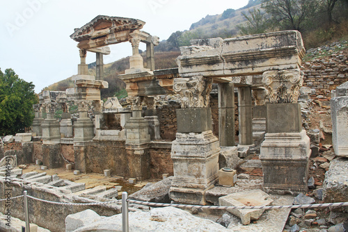 Принти на полотні Fountain of Trajan, the Nympheum, on Curetes Street  which was dedicated to the emperor Trojan along the Curetes Road in the ancient city ruins of Ephesus, Turkey near Selcuk