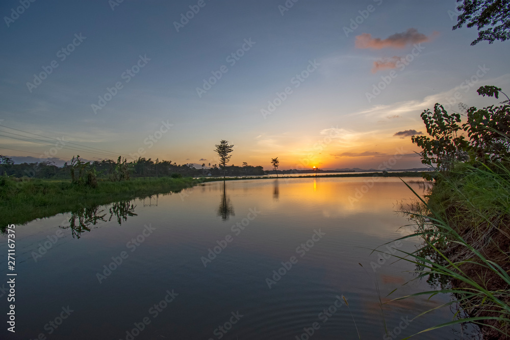 Beautiful sunsets on the banks of the river Indonesia in Java