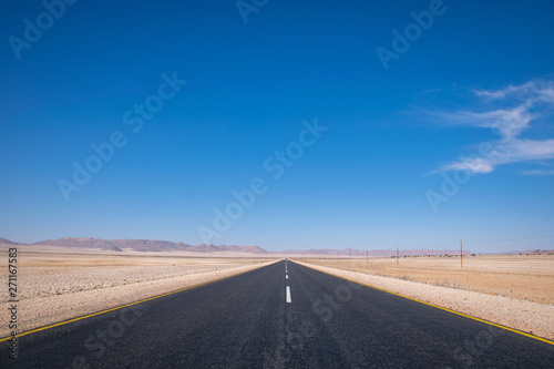 A road with breathtaking and straight lines, Namibia