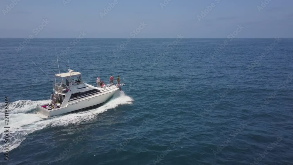 Aerial: Fishing Boat Traveling Through Calm Ocean - San Diego, California Aerial: Fishing Boat Traveling Through Calm Ocean - San Diego, California