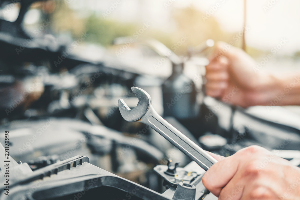 Auto mechanic working in garage Technician Hands of car mechanic working in auto repair Service and Maintenance car check Auto mechanic working in garage Technician Hands of car mechanic working in auto repair Service and Maintenance car check