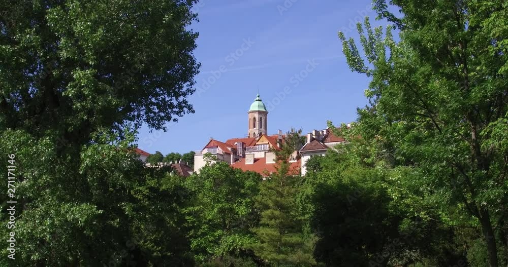 View of the tower of the Mary Magdalene in the Buda Castle from the Blood Field Park in Budapest. View of the tower of the Mary Magdalene in the Buda Castle from the Blood Field Park in Budapest.