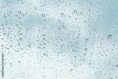 Raindrops on window glasses surface , Natural Pattern of raindrops.