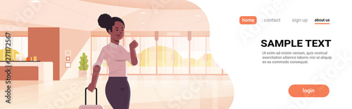 businesswoman with luggage modern at reception area african american business woman holding suitcase girl standing contemporary lobby hotel hall interior flat horizontal portrait copy space