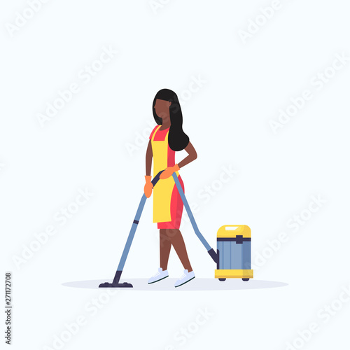 woman in apron using vacuum cleaner african american female janitor cleaning service floor care concept flat full length white background