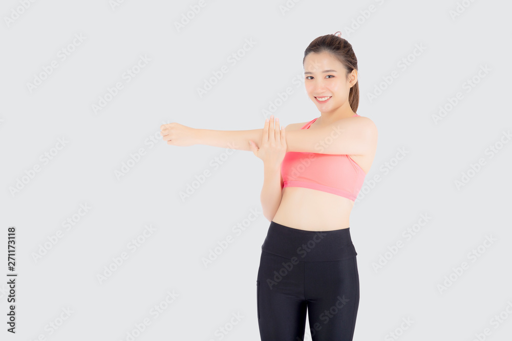 Beautiful portrait young asian woman standing stretch muscle arm isolated on white background, girl wear sport clothes exercise and yoga for health, wellness concept. Beautiful portrait young asian woman standing stretch muscle arm isolated on white background, girl wear sport clothes exercise and yoga for health, wellness concept.