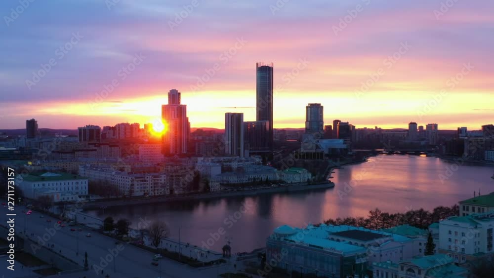 Beautiful aerial view of the city and river at sunset. Beautiful aerial view of the city and river at sunset.