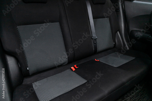 Сlose-up of the car   interior: black rear seats and seat belts . © Виталий Сова