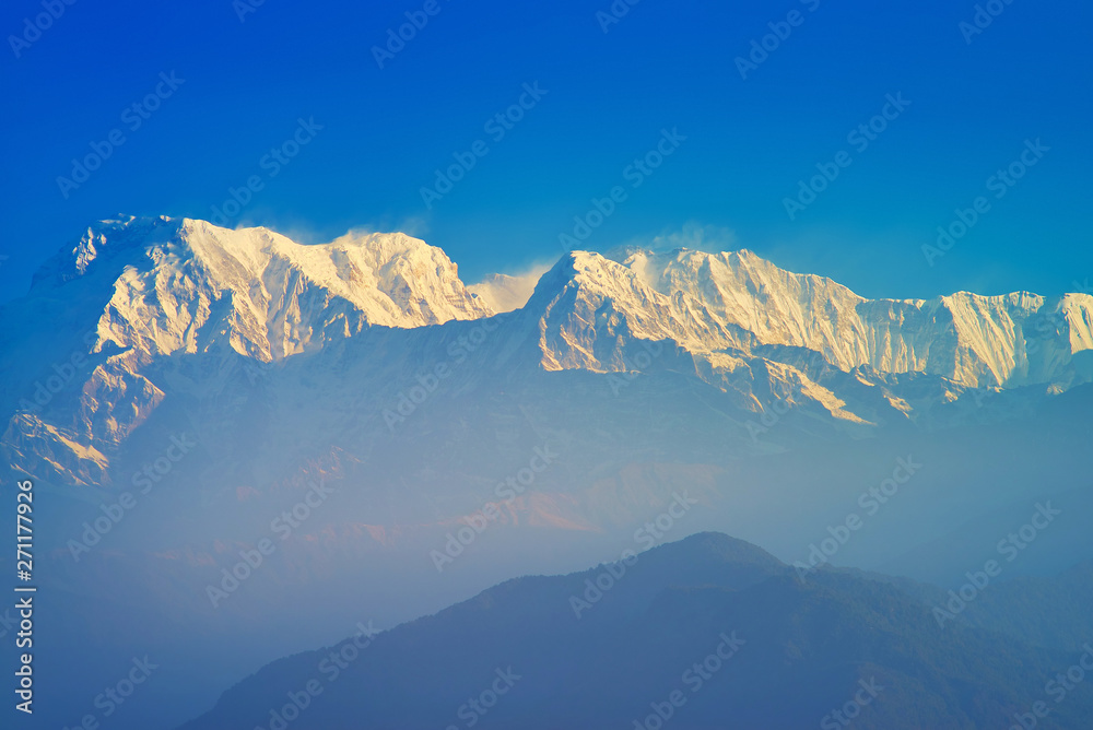 The Annapurna massif in the morning time with sunrise, seen from Methlang Hill, Pokhara, Nepal. The Annapurna massif in the morning time with sunrise, seen from Methlang Hill, Pokhara, Nepal.