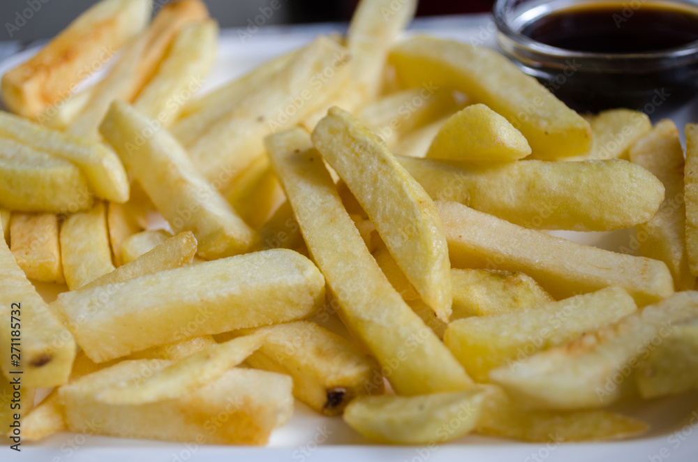 French fries golden color. Unhealthy food French fries golden color. Unhealthy food