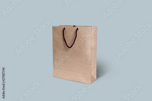 Brown Paper Bag on isolated on blue background. Mock up.