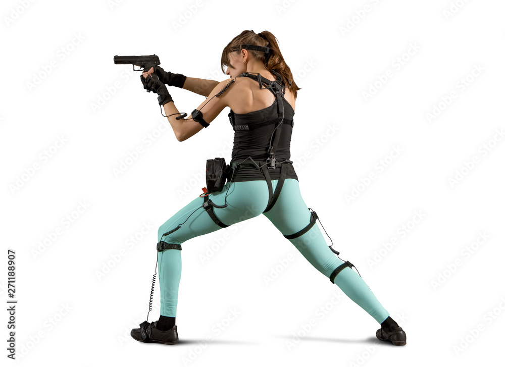 Woman playing on the simulator virtual reality, holding gun Woman playing on the simulator virtual reality, holding gun