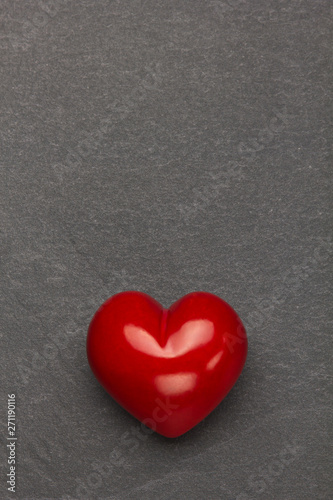 Heart on a stone background. Background to Valentine's Day.