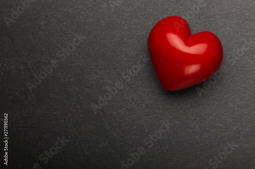 Heart on a stone background. Background to Valentine's Day.