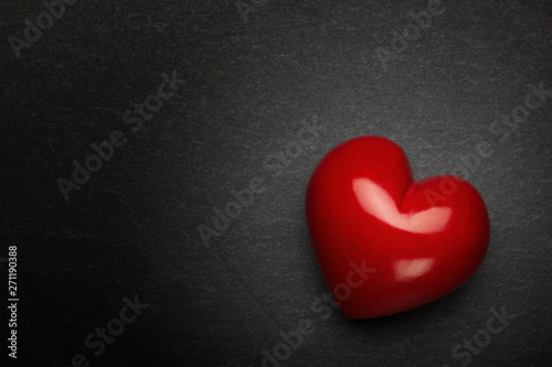 Heart on a stone background. Background to Valentine's Day.