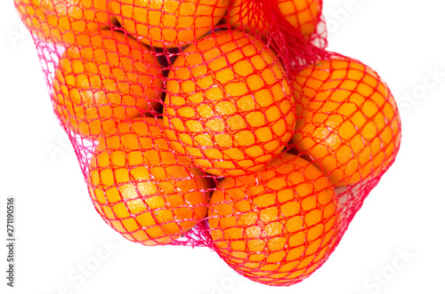 ripe oranges in the net background