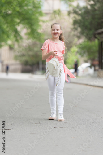 Fashion is her life. Fashionable little child in casual fashion on city street. Fashion look of small vogue model. Adorable girl of fashion on summer day © be free