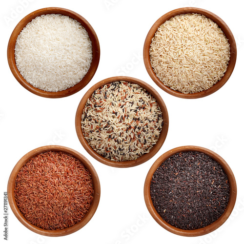 A set of wooden cups with rice: white rice, unpolished rice, red rice, black rice, mixed rice. Natural products, healthy food.