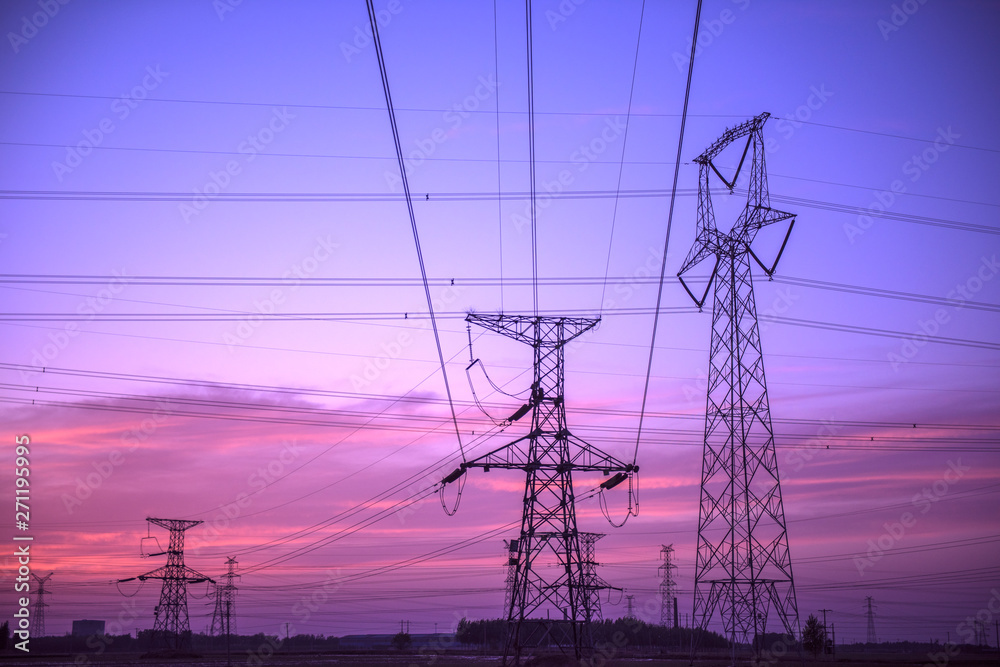 Silhouette of Power Supply Facilities at Sunset Silhouette of Power Supply Facilities at Sunset