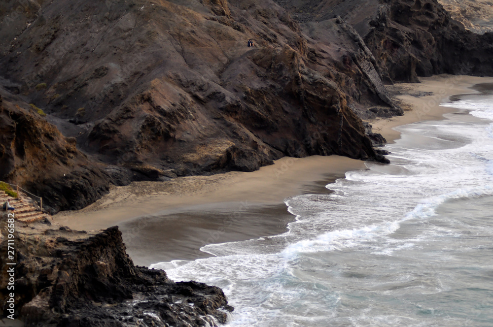 Beautiful view of a rocky Atlantic Ocean Coast and wild beach La Pared. Fuerteventura Canary Islands, Spain Beautiful view of a rocky Atlantic Ocean Coast and wild beach La Pared. Fuerteventura Canary Islands, Spain