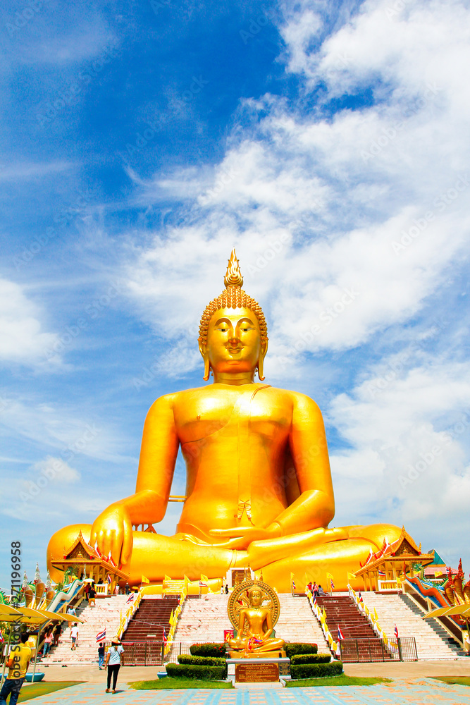 Big Golden Buddha with blue sky blue at Wat Muang, Ang Thong Province, Thailand Big Golden Buddha with blue sky blue at Wat Muang, Ang Thong Province, Thailand