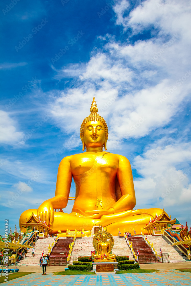 Big Golden Buddha with blue sky blue at Wat Muang, Ang Thong Province, Thailand Big Golden Buddha with blue sky blue at Wat Muang, Ang Thong Province, Thailand