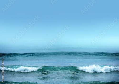 Seascape image of beautiful close up waves in moody rainy morning