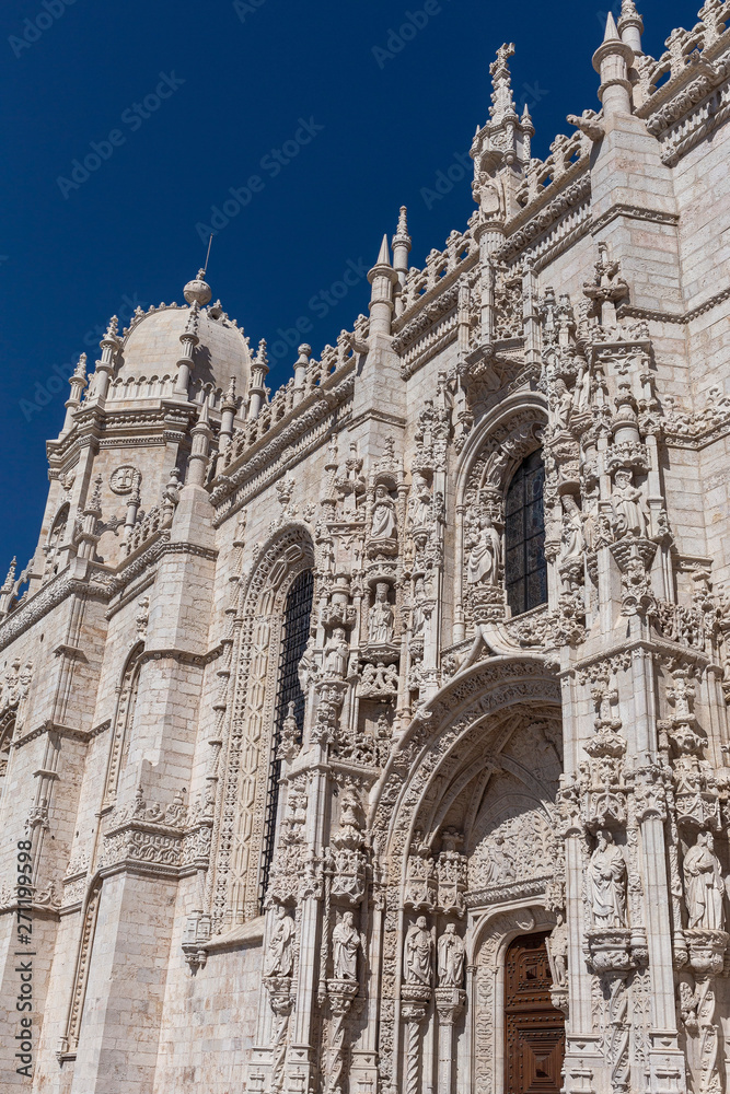 bottom view of a fragment of the facade of the monastery of Jeronimos in the Portuguese capital Lisbon