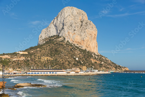 Penon de Ifach Calp Spain landmark rock Spanish Mediterranean coast with blue sky photo