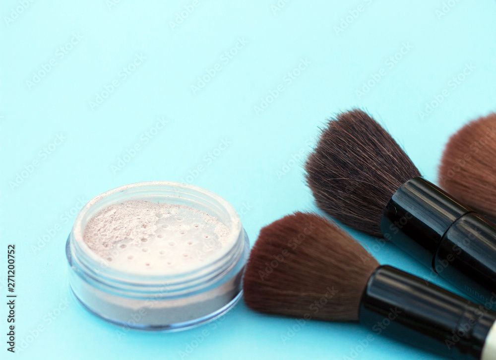 make up brushes cosmetics blue background copy space make up brushes cosmetics blue background copy space