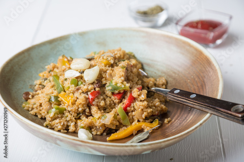 Pilaf Bulgur with vegetables and spices