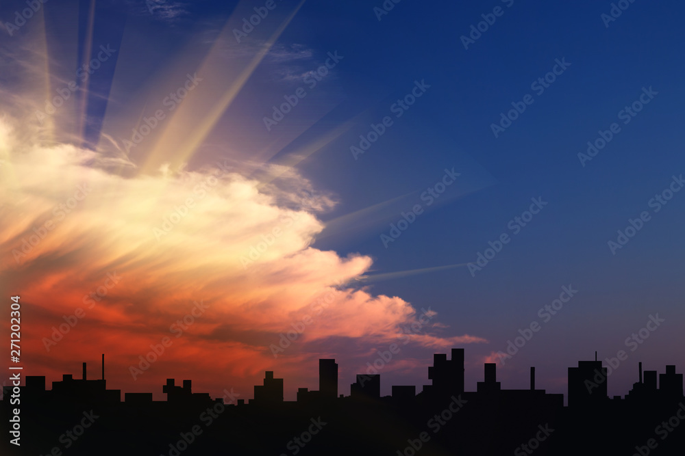 Silhouette of the city against the sunset sky